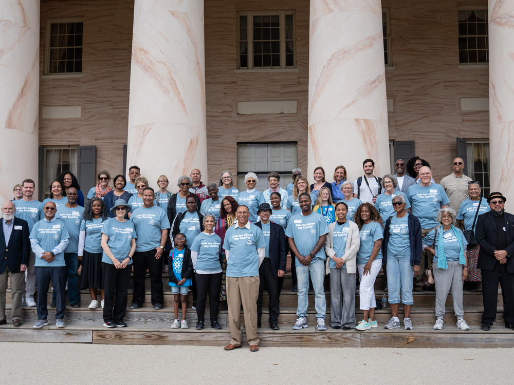 Descendants of the enslavers and the enslaved unite for a family portrait at the Arlington House, the former plantation once owned by Confederate Gen. Robert E. Lee and his wife, Mary Custis Lee.