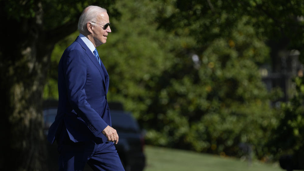 President Biden walks across the South Lawn of the White House on April 21, as he heads to Marine One to travel to Camp David for the weekend.