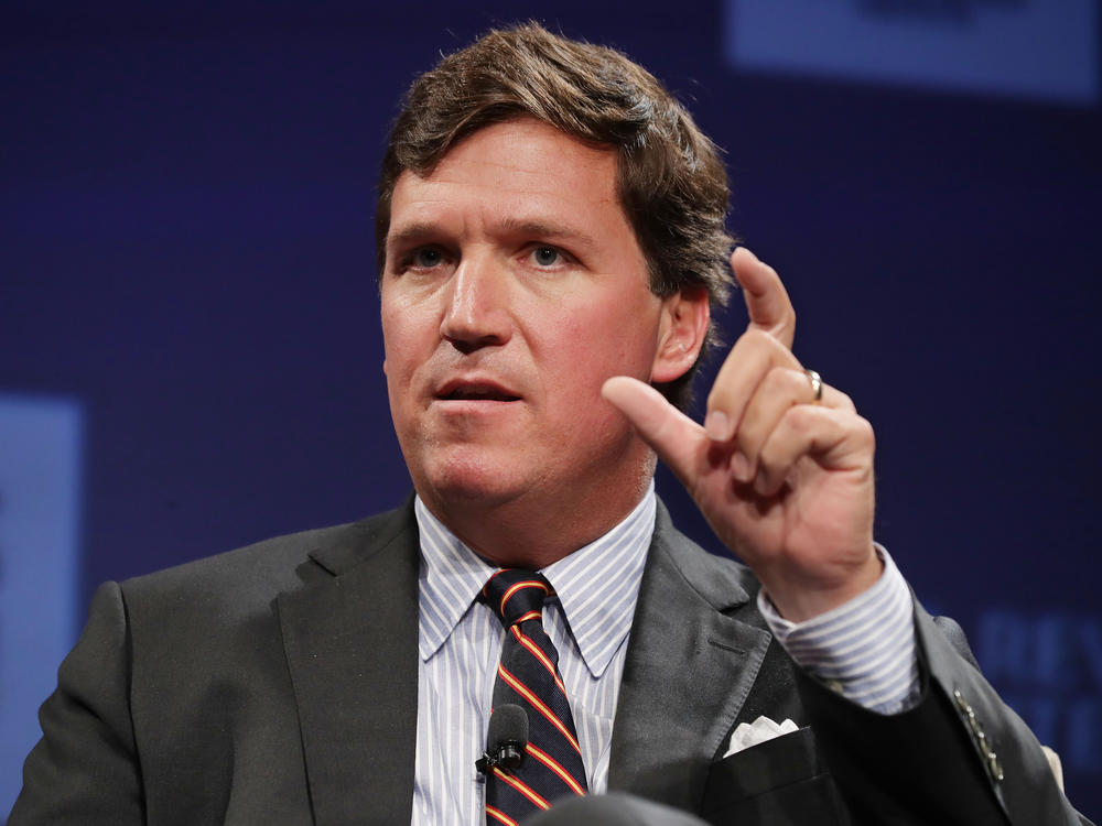 Fox News host Tucker Carlson speaks at a National Review Institute event on March 29, 2019, in Washington, D.C. The network announced Monday that it would 