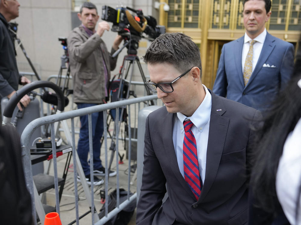 Brian Kolfage leaves court in New York on Wednesday after being sentenced for defrauding donors to the We Build the Wall effort.