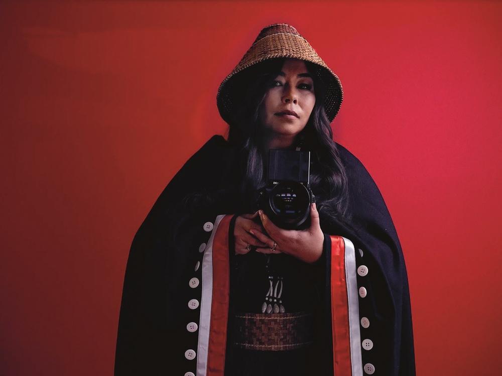 Matika Wilbur, pictured here in a self portrait, describes her work as a narrative correction.