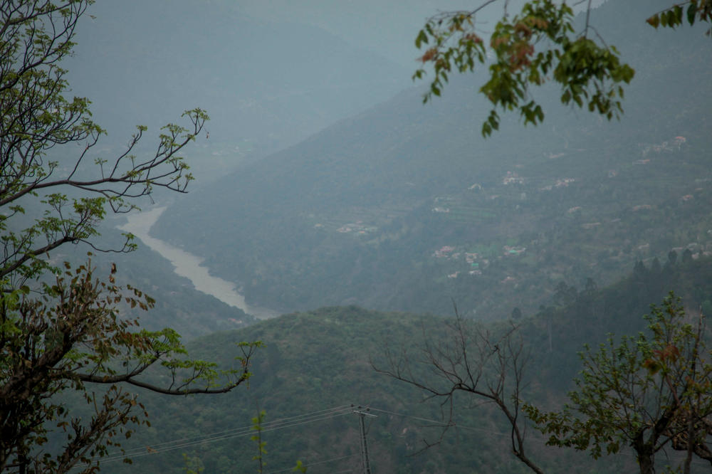 The Jhelum River as seen from the Pakistani province of Khyber Pakhtunkhwa. The Indus Waters Treaty allocates the river to Pakistan, even though it forms in India and India is allowed to build hydroelectric plants on the upper parts. Pakistan protests that one of those Indian plants has meant less water in the river to operate its own hydroelectric plant.