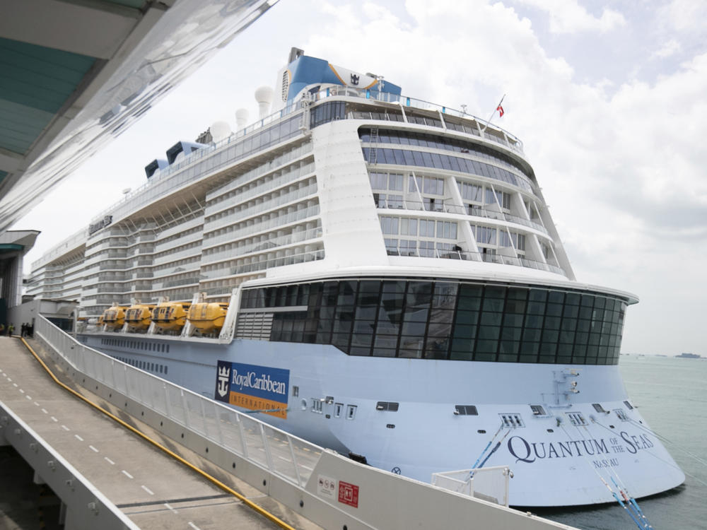 The Quantum of the Seas cruise ship is docked at the Marina Bay Cruise Center Wednesday, Dec. 9, 2020 in Singapore.