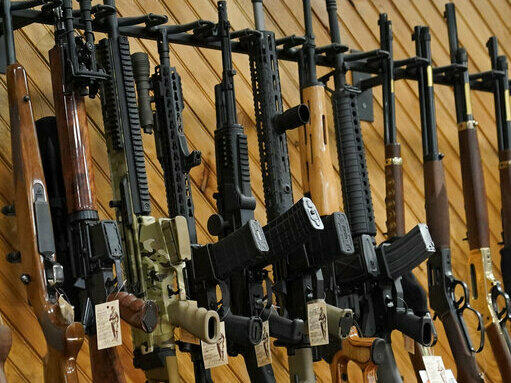 Guns on display at a store in Auburn, Maine.
