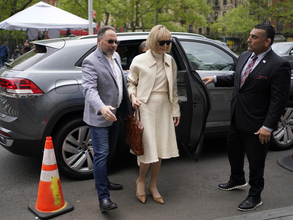 E. Jean Carroll arrives at federal court in New York, on Thursday. The writer told a jury that Donald Trump raped her at a department store in 1990s.