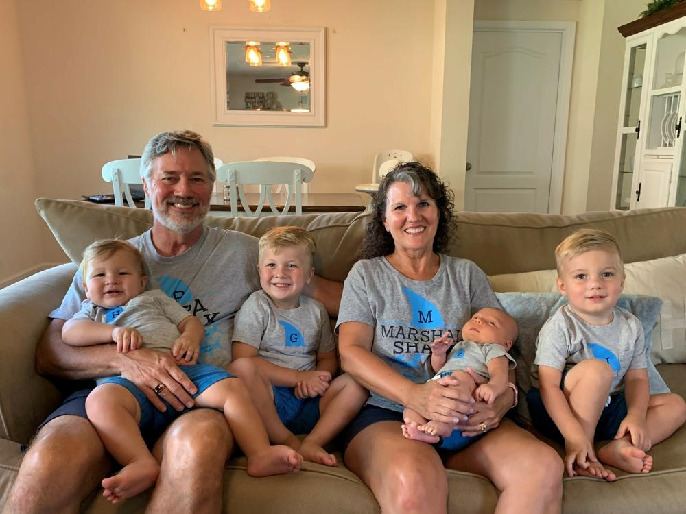 David and Marcia Elder at home with their grandchildren, before David got sick. During his recovery at home, he looked forward to visits from the grandkids.