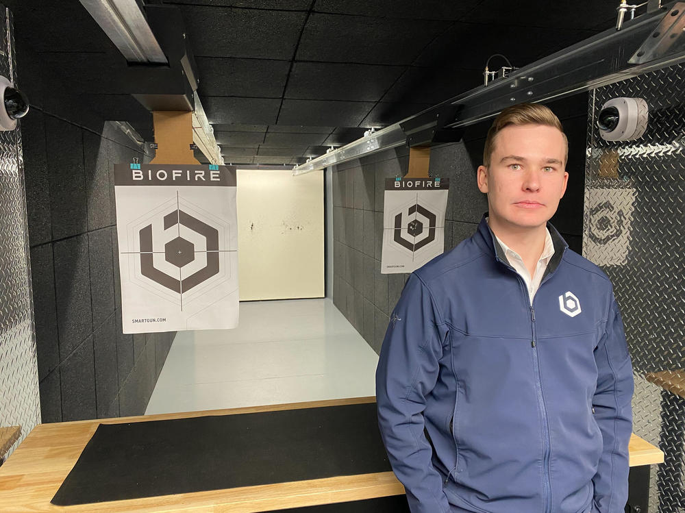 Kai Kloepfer stands in the firing range at Biofire's headquarters outside Denver.