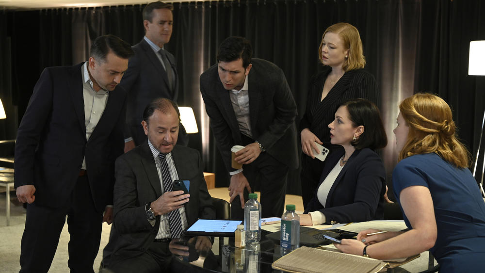 Now this is a group of people who are surprised to find themselves impressed by Kendall. (Kieran Culkin, Matthew Macfadyen, Fisher Stevens, Nicholas Braun, Sarah Snook, Dagmara Dominczyk)