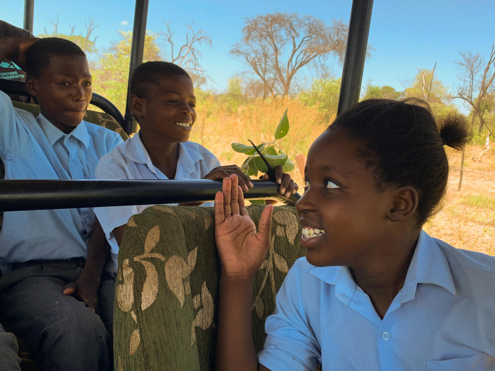 Fortune Kalafo, 13, (left) and Lorato (right) share a laugh during the safari.