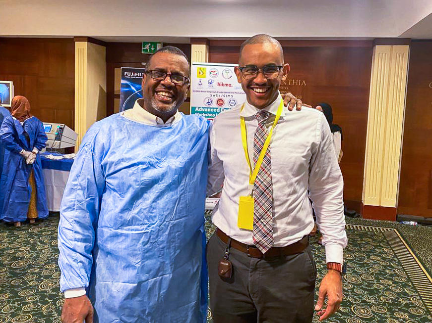Dr. Bushra Sulieman (left) and Dr. Mohamed Eisa in February 2023 at a workshop in Khartoum. Sulieman was killed on April 25 in Khartoum. It's believed he was stabbed to death during a robbery attempt amid the turmoil of the conflict that has broken out in Sudan.