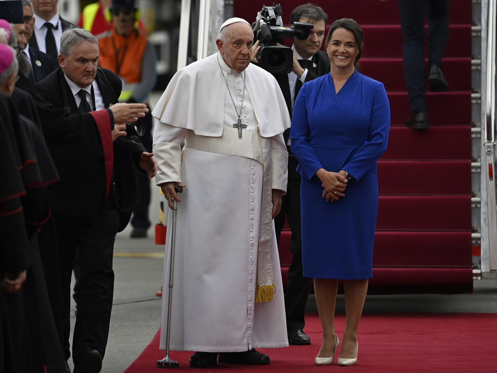 Pope Francis is greeted by Hungary President Katalin Novak during the farewell ceremony at the Budapest International Airport in Budapest, Hungary, on Sunday.