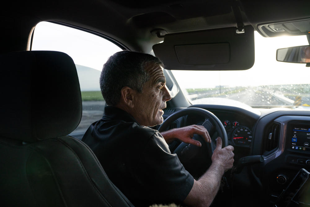 George Mendes drives to check the water at the levees near his home in Corcoran. The drive has become a daily ritual for him and his wife as they anxiously watch the waters continue to rise.