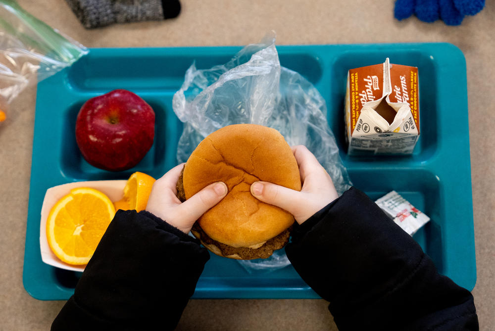 A student at Oakville Elementary School eats his lunch on Wednesday, March 8, 2023, at the school in Oakville, Mo.