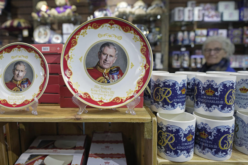 Coronation plates and cups are displayed for sale in a gift shop in London on April 24.