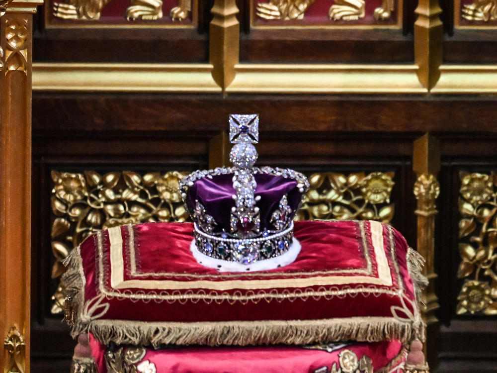 The Imperial State Crown sits on display during the State Opening of Parliament in the House of Lords in London on May 10, 2022.