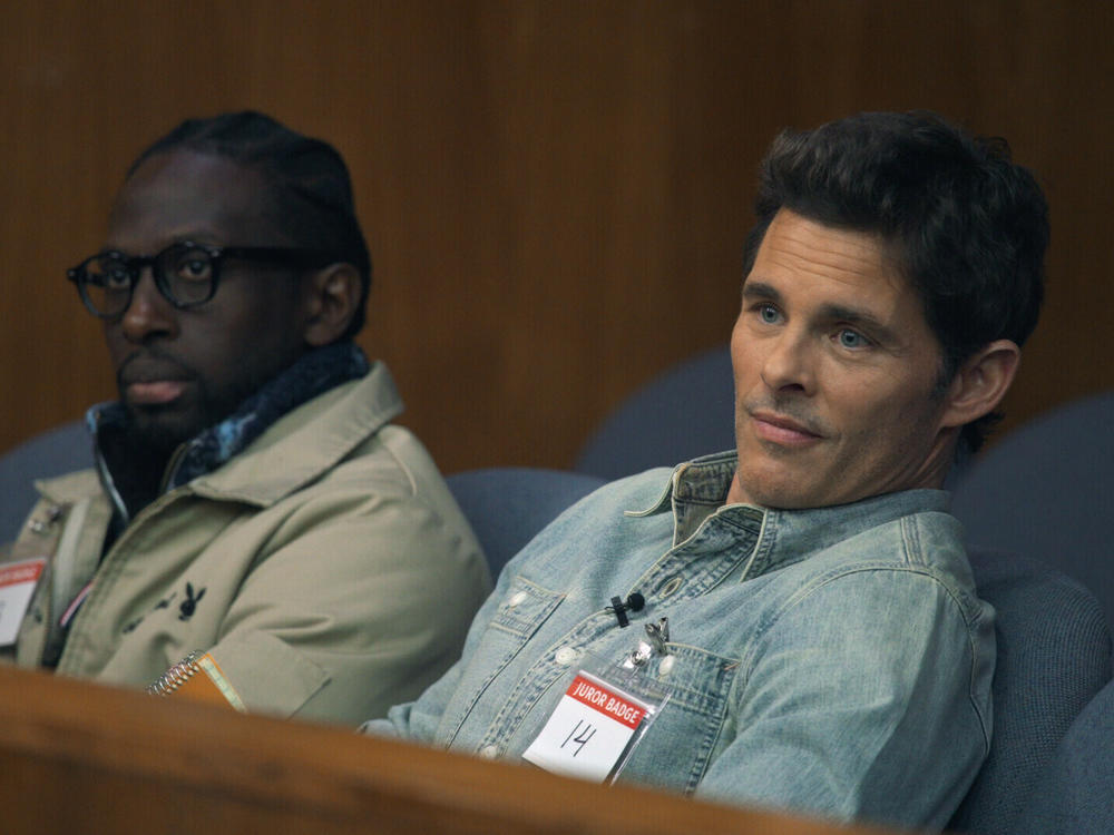 Ishmel Sahid, left, and James Marsden play alternate jurors in the series <em>Jury Duty.</em>
