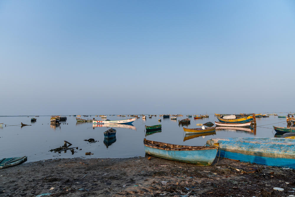 Boats off the beach at Chinnapalam village, Pamban island, Tamil Nadu, India.