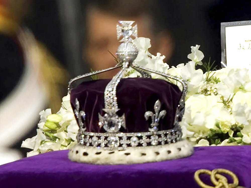 The Koh-i-noor diamond, set in the Maltese Cross at the front of the crown made for Britain's late Queen Mother Elizabeth, is seen on her coffin at London's Westminster Hall. Camilla, the queen consort, will not use the Koh-i-noor diamond in her coronation crown, but will modify Queen Mary's crown, using diamonds from Queen Elizabeth II's personal collection.