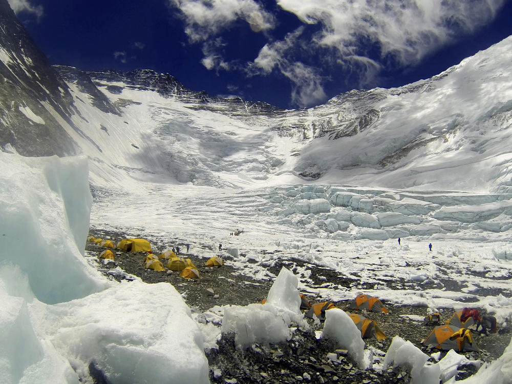 Tents are pitched on Camp 2, as climbers rest on their way to summit Mount Everest on May 16, 2013. University of Washington officials say a retired Seattle doctor died on Monday, May 1, 2023, while climbing Mount Everest. Dr. Jonathan Sugarman was climbing the mountain as part of an expedition arranged by Washington state-based International Mountain Guides.