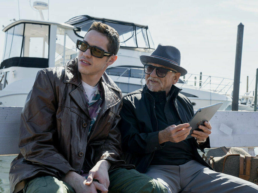 Pete Davidson (left) as a fictionalized version of himself, and Joe Pesci as Joe Larocca in <em>Bupkis.</em>