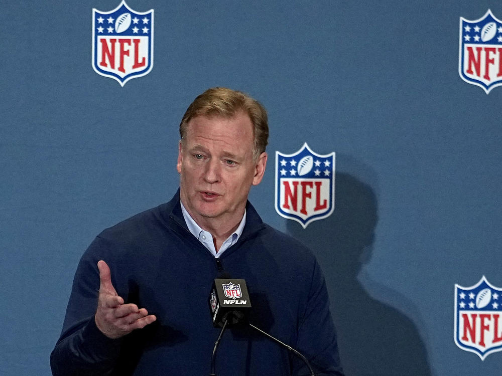 NFL Commissioner Roger Goodell speaks to the media on March 28 in Phoenix. The attorneys general of New York and California announced Thursday that they are investigating allegations of workplace discrimination by the pro football league.