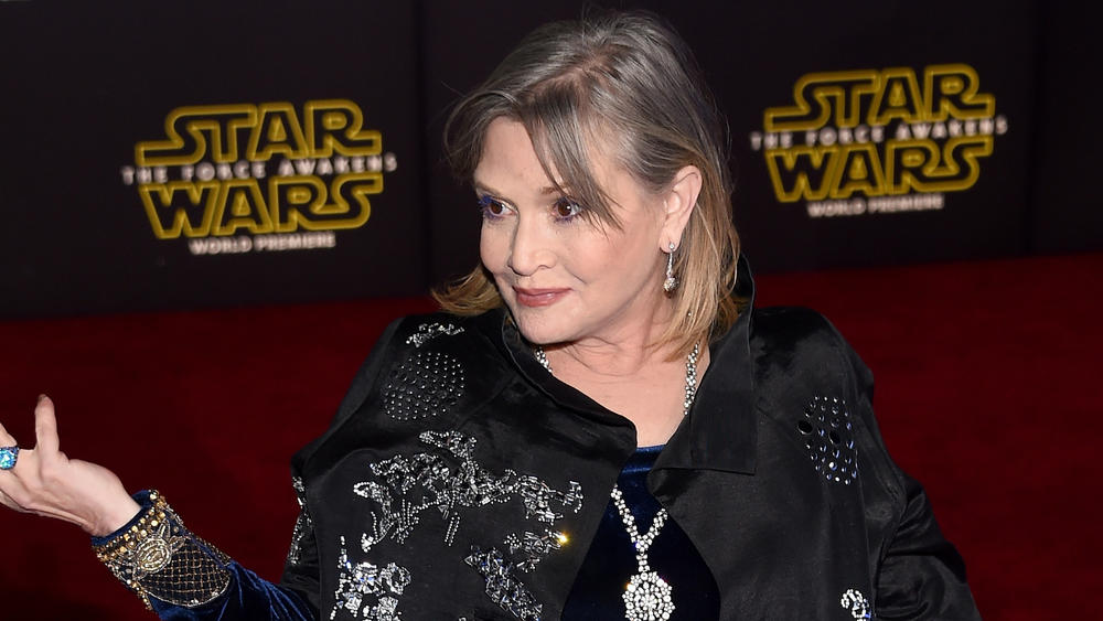 Actress Carrie Fisher attends the premiere of <em>Star Wars: The Force Awakens</em> at the Dolby Theatre in Hollywood on Dec. 14, 2015. The late actress is being honored with a star on the Hollywood Walk of Fame on Thursday.