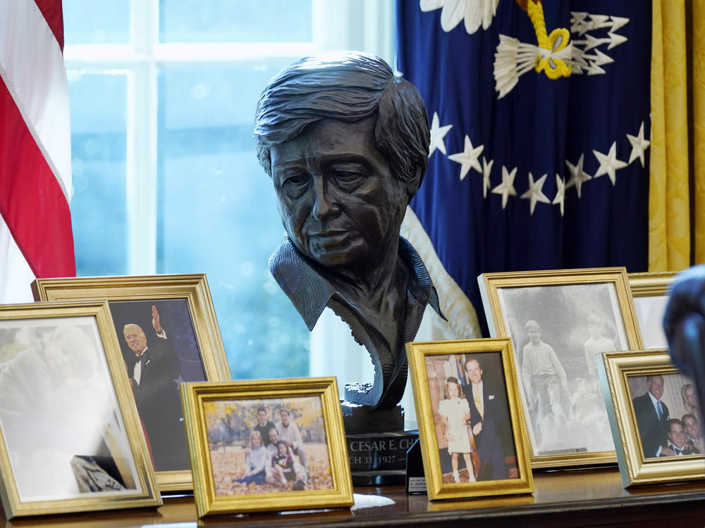 A bust of iconic labor leader César Chávez is displayed in the Oval Office of the White House.