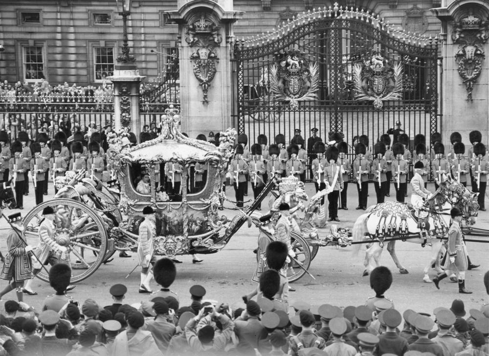 Queen Elizabeth II leaves Buckingham Palace before her coronation ceremony.