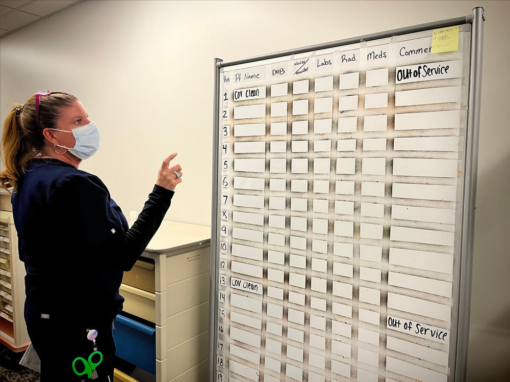 ER nurse Dona Thomas and her colleagues came up with a makeshift system – involving a white board and dry erase markers – to keep track of patient care in the months following the cyberattack on Johnson Memorial. The white board and other tools they used during the cyberattack are still stored in a backroom, in case another attack takes place.