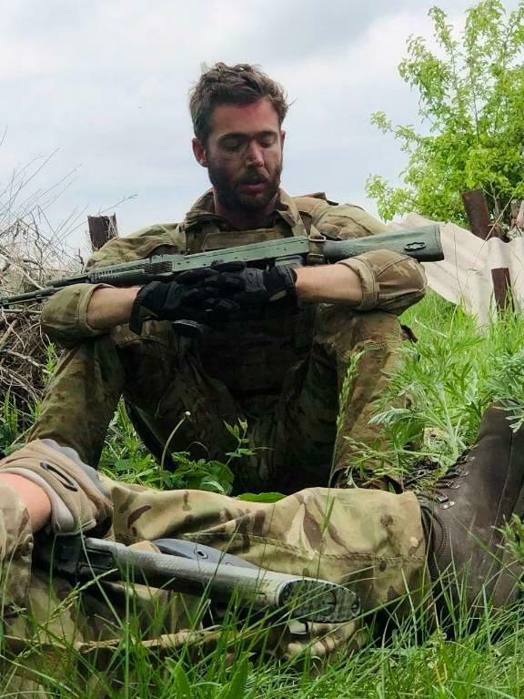 In this photo from the Campbell family, Christopher Campbell is seen on the front line of the war.