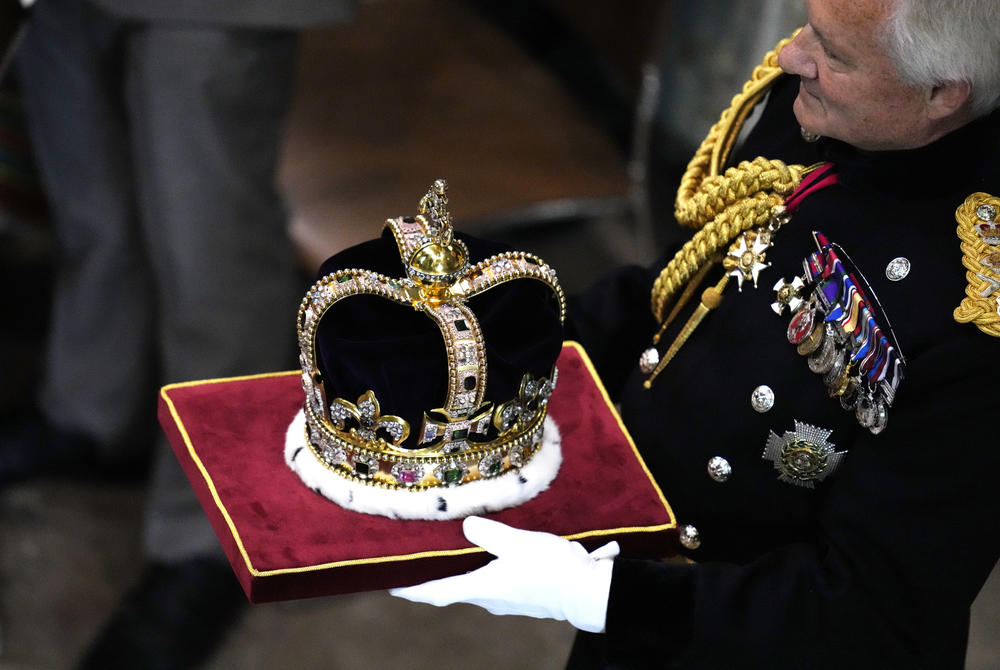 St Edward's Crown is carried during the coronation ceremony.