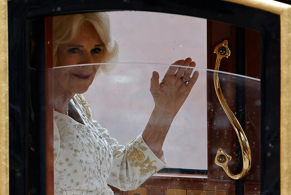 Britain's Camilla, Queen Consort rides in the Diamond Jubilee State Coach, during the 'King's Procession', a journey of two kilometres from Buckingham Palace to Westminster Abbey.