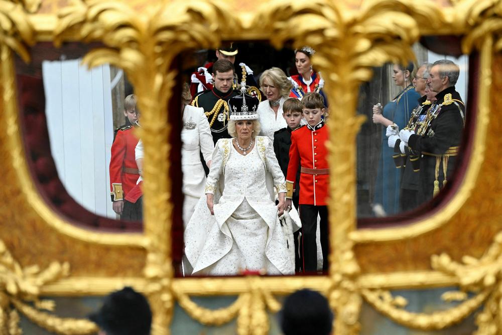 Britain's Queen Camilla, wearing a modified version of Queen Mary's Crown leaves Westminster Abbey after the Coronation Ceremonies .