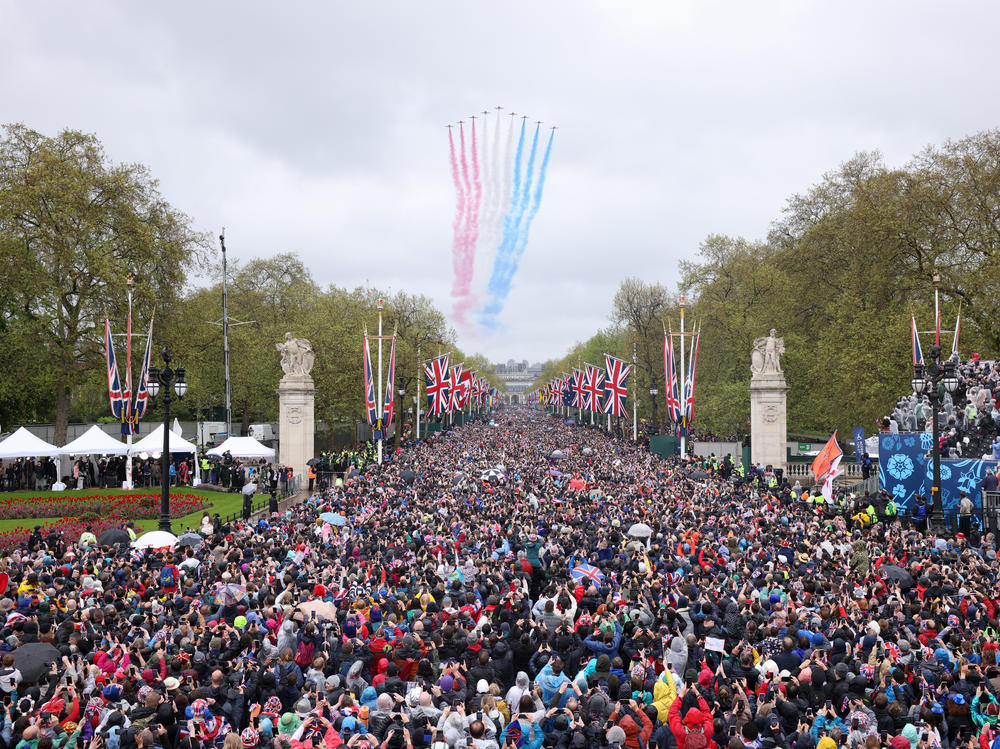 The Royal Air Force Aerobatic Team, otherwise known as The Red Arrows, fly over The Mall during the Coronation of King Charles III and Queen Camilla on Saturday.
