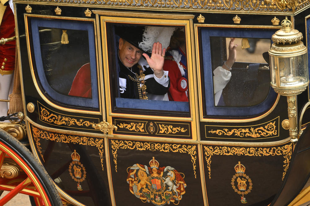 Britain's Prince Edward, Duke of Edinburgh travels back to Buckingham Palace from Westminster Abbey following the coronation of King Charles III and Queen Camilla.