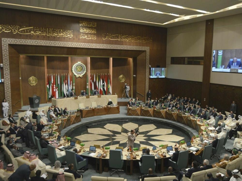 Delegates and foreign ministers of member states convene at the Arab League headquarters in Cairo, Egypt, on Sunday. The ministers are voted on restoring Syria's membership to the organization after it was suspended over a decade ago.
