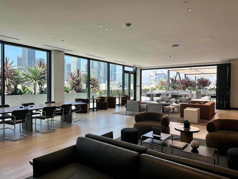 A common workspace area sits empty on a weekday afternoon in a newly redeveloped building that Adidas started leasing in downtown Los Angeles last year.