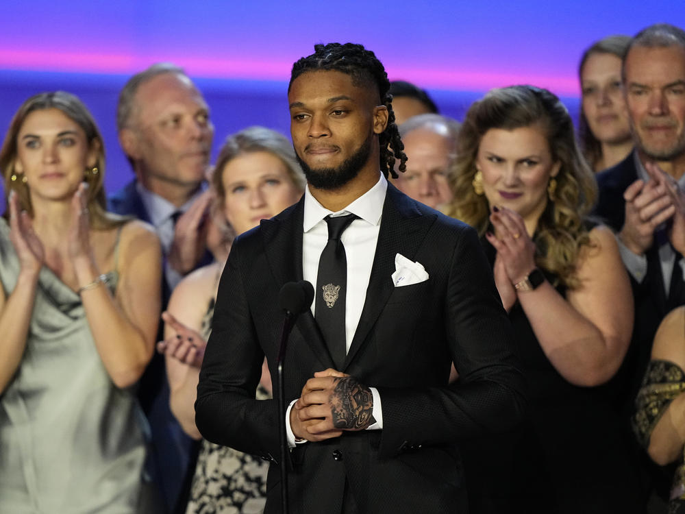 Buffalo Bills' Damar Hamlin speaks in front of University of Cincinnati Medical Center staff during the NFL Honors award show ahead of the Super Bowl 57 football game, Thursday, Feb. 9, 2023, in Phoenix.