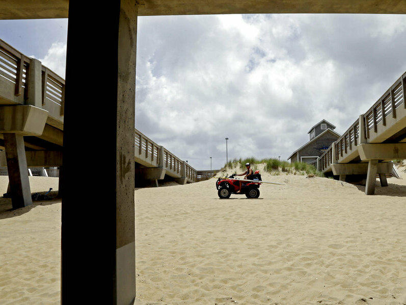 Beach patrol personnel monitor conditions in July 2014 in Nags Head, N.C.