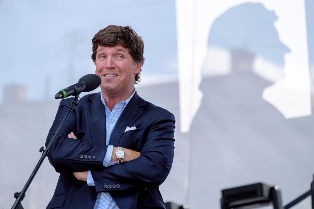 Tucker Carlson speaks at a political event on Aug. 7, 2021, in Esztergom, Hungary. Carlson, who was fired from Fox News last month, announced he is taking his show to Twitter.