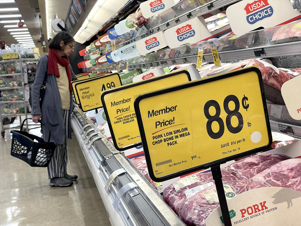 A customer shops for meat at a Safeway store in San Rafael, Calif., on April 12, 2023. Consumer prices eased slightly in April from the previous month but are still too high for the Fed's comfort.