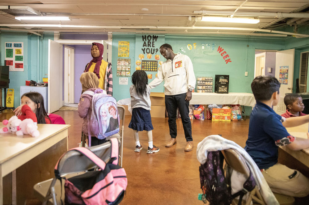 Director of Diversity, Equity, and Inclusion Isaac James greets children at the Memphis Refugee Empowerment Program on a Wednesday in February.