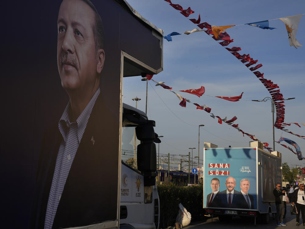 A poster of President Recep Tayyip Erdogan, left, on a truck near an election poster of presidential candidate Kemal Kilicdaroglu in Istanbul, Turkey, May 8.