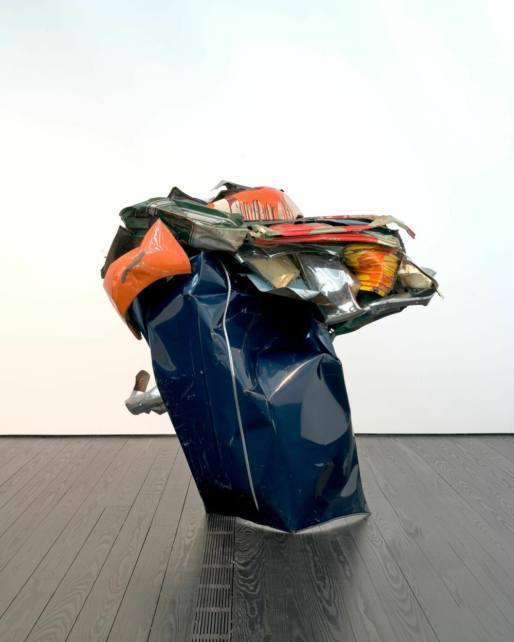John Chamberlain, <em>Rooster Starfoot,</em> 1976.Paint and chromium-plated steel, 79 1/2 × 737/8 × 44 in. (201.9 × 187.6 × 111.8 cm). The Menil Collection, Houston, Gift of Heiner and Fariha Friedrich. Conservation was funded by a grant from the Bank of America Art Conservation Project