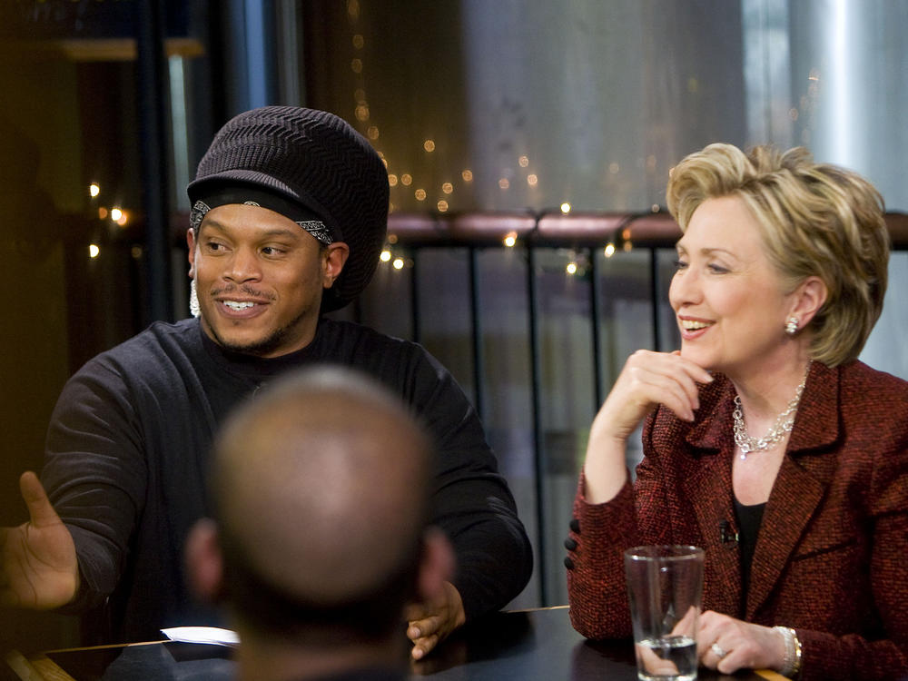MTV news correspondent Sway Calloway and Hillary Clinton speak to Iraq War veterans during a taping of MTV's 