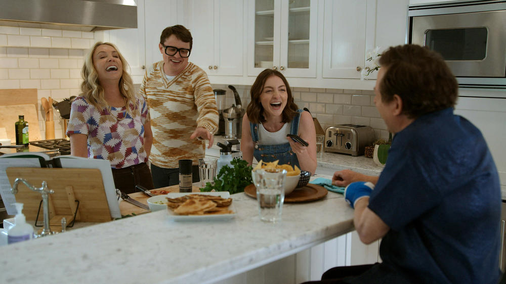 Michael J. Fox (far right) with wife Tracy Pollan, son Sam and daughter Esme.