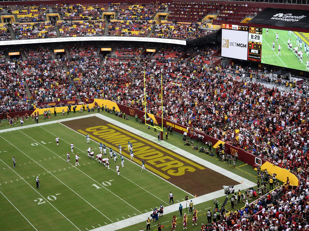 Fans watch as the Washington Commanders face the Jacksonville Jaguars in an NFL football game on Sept. 11, 2022, in Landover, Md.