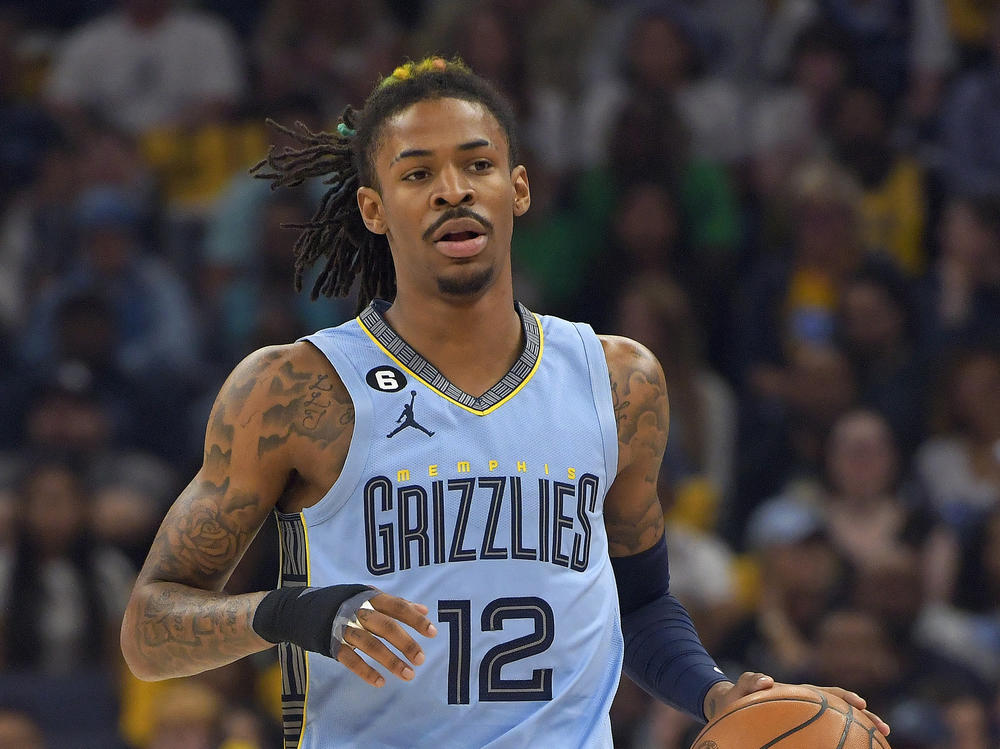 Memphis Grizzlies guard Ja Morant handles the ball during the first half of Game 5 in a first-round NBA basketball playoff series against the Los Angeles Lakers on Wednesday, April 26, in Memphis, Tenn.