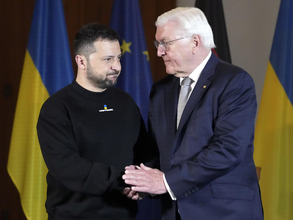 Germany's President Frank-Walter Steinmeier, right, greets Ukraine's Pesident Volodymyr Zelenskyy at Bellevue Palace in Berlin, Germany, Sunday, May 14, 2023. Ukrainian President Volodymyr Zelenskyy arrived in Berlin early Sunday for talks with German leaders about further arms deliveries to help his country fend off the Russian invasion and rebuild what's been destroyed in the conflict.