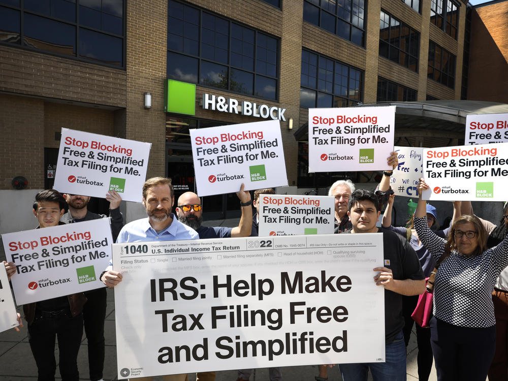 Advocates gather in Washington, D.C., on April 17, 2023, to call out tax prep companies like Intuit TurboTax and H&R Block for blocking simplified filing and to support the IRS in its exploration of alternative free tax filing  in Washington, DC.